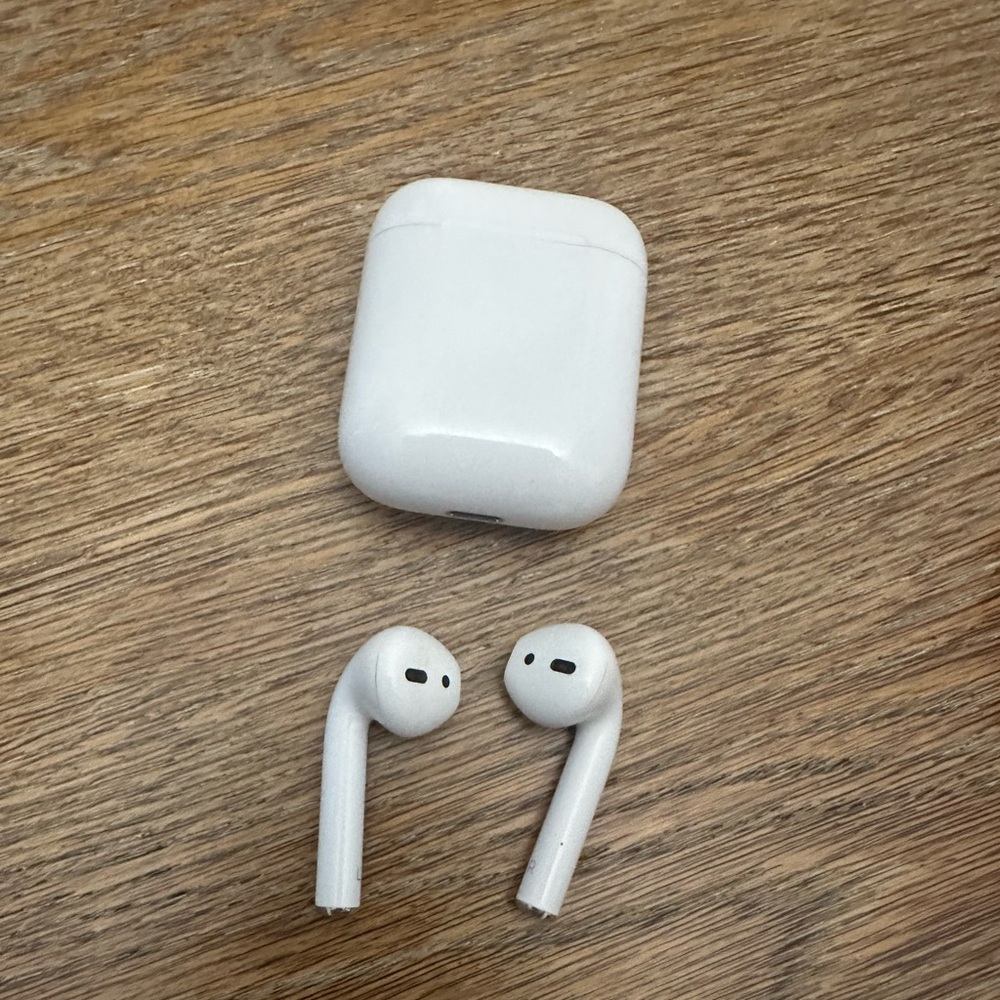 Apple AirPods w/ case.